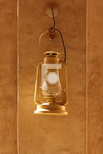 antique arabic lamp lantern with textured wall
