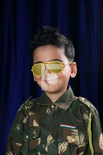 Asian / Indian Boy Dressed as a Soldier / Armed Forces Personnel