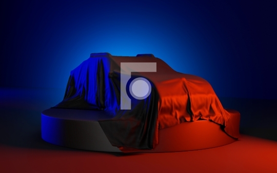 Car Covered with a Satin Fabric in an Exhibition for Unveiling o