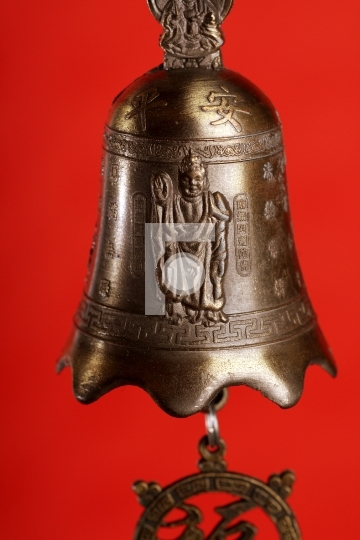 Chinese bell with buddha