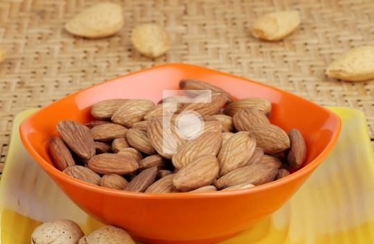 Closeup of Almonds in Orange Bowl
