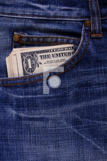 currency notes on a jeans pocket