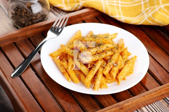 Food - Tasty Penne Pasta Plate with a Fork on Wooden Tray