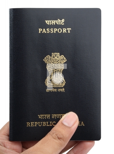 indian passport in a hand