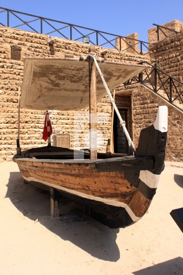 Old boat inside dubai museum, united arab emirates