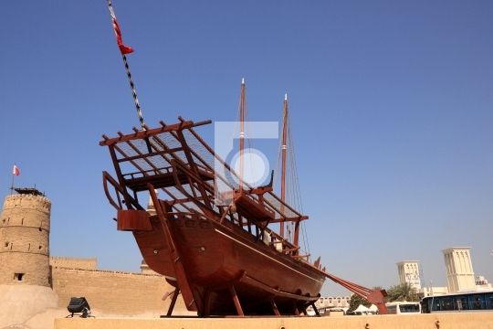 old boat on display near fahidi fort, dubai, united arab emirate