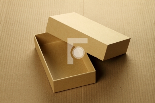 Recycle Blank Card Board Box for Mockup on Corrugated Background
