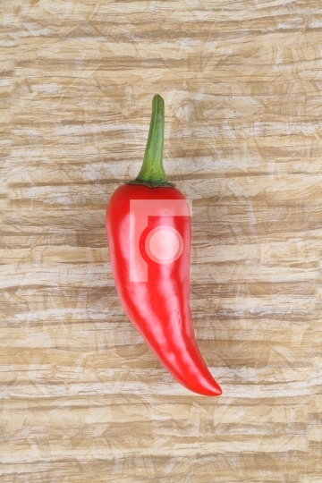 Red Indian Chilli on wooden Background