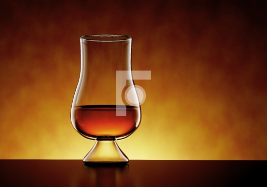 Scotch Whisky, bourbon or rum in a Glass on amber background - 3