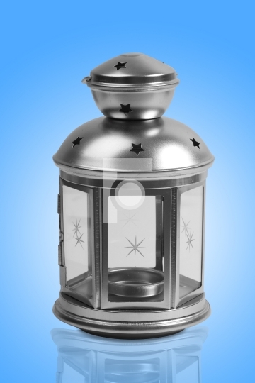Silver lamp with blue background
