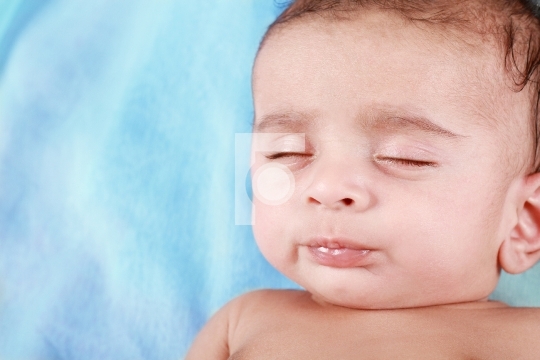 Sleeping Baby Boy with blue background