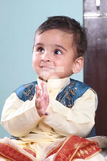 Smiling Indian Baby Boy in Traditional Indian Outfit Kurta