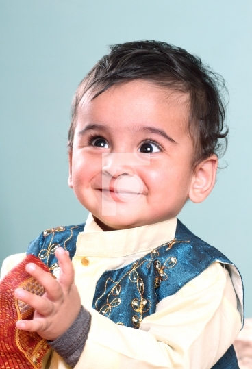 Smiling Indian Baby in Tranditional Clothing