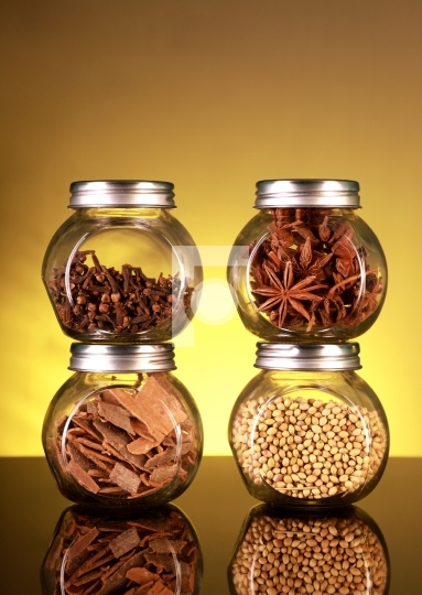 Spice Jars with Star Anise, Cloves, Cinnamon, Coriander Seeds