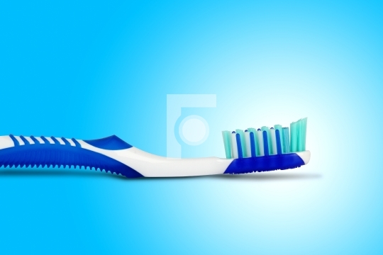 Tooth brush in blue background