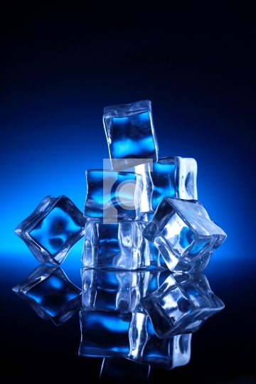 Ice Cubes Stacked up on Blue Background - Fotonium